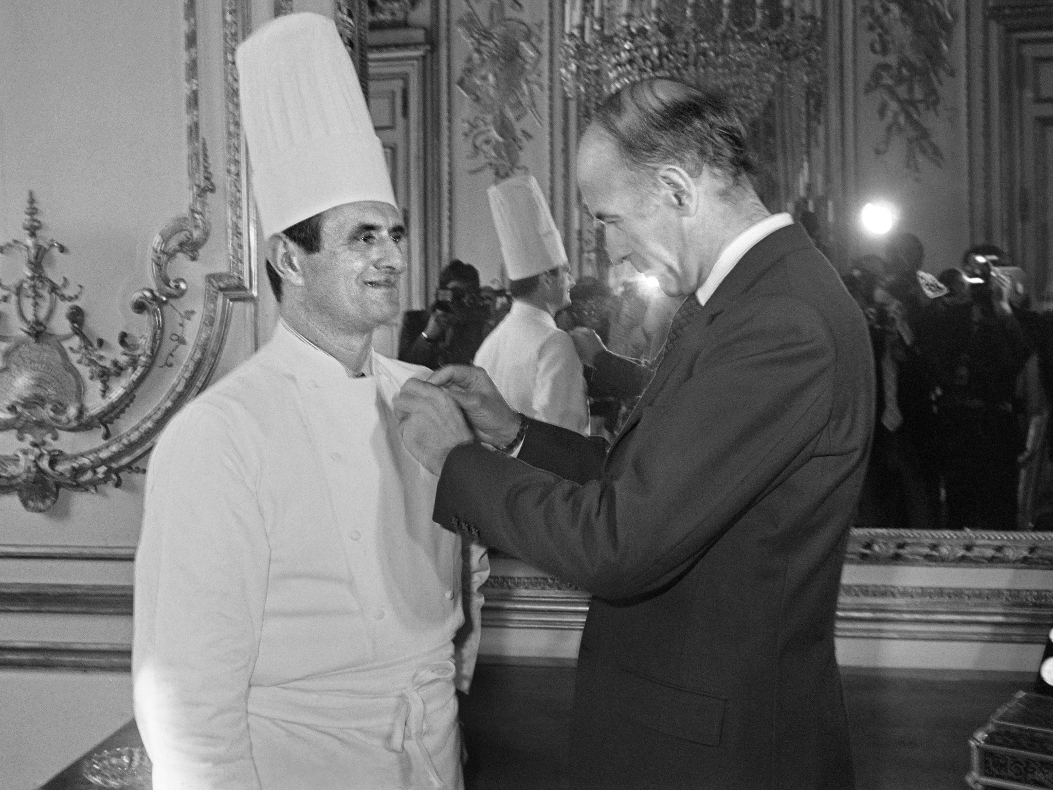 French President Valéry Giscard d’Estaing awards Bocuse the Legion d’Honneur in 1975