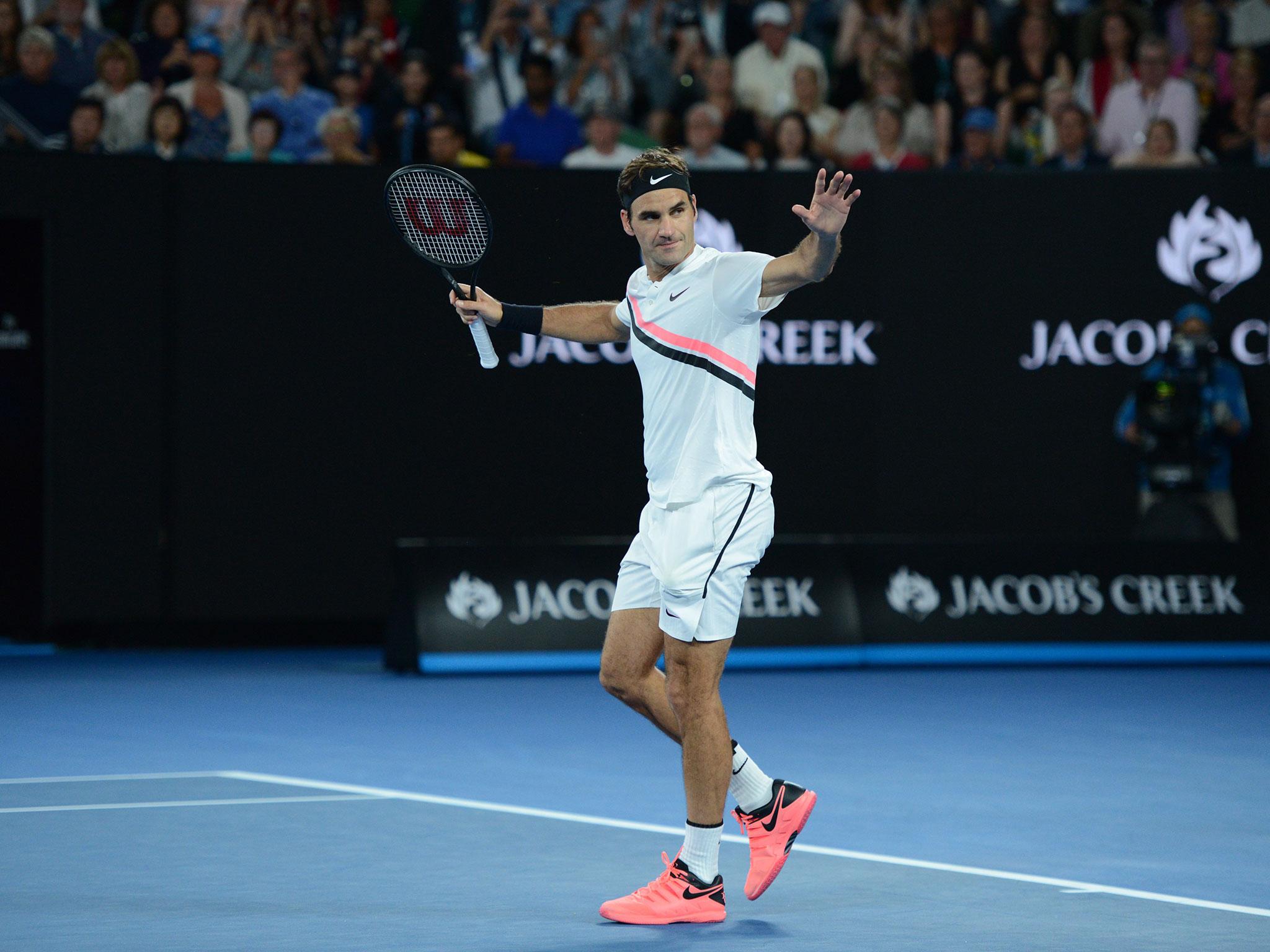 Roger Federer celebrates after his victory over Tomas Berdych