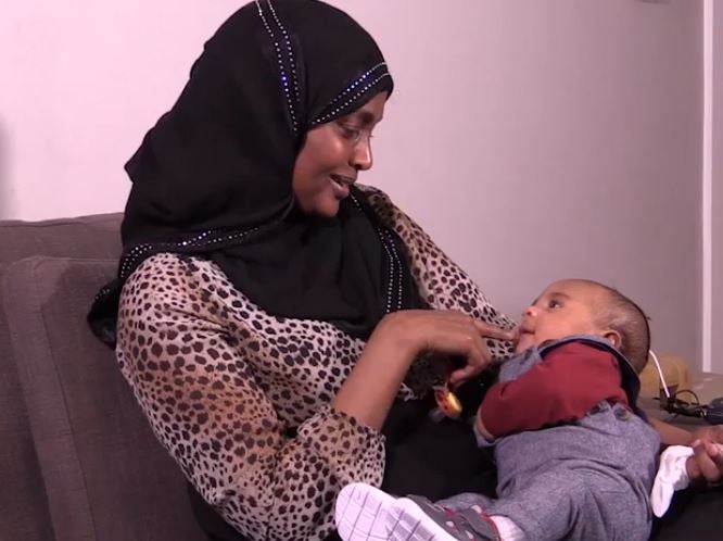 Grenfell Tower fire survivor Maryam Adam and her son Mohammed