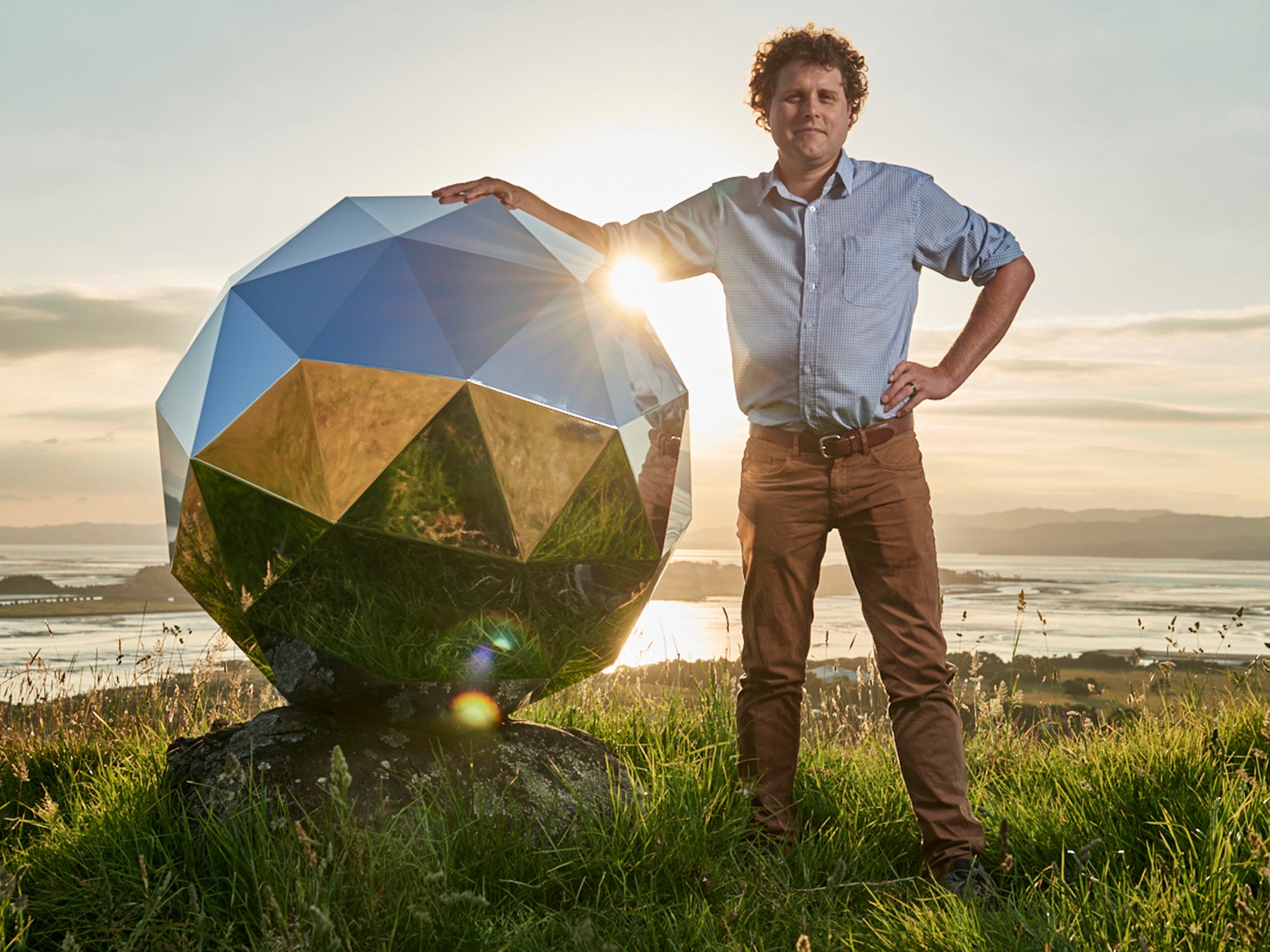 Rocket Lab founder and CEO Peter Beck is pictured with his "Humanity Star" in Auckland