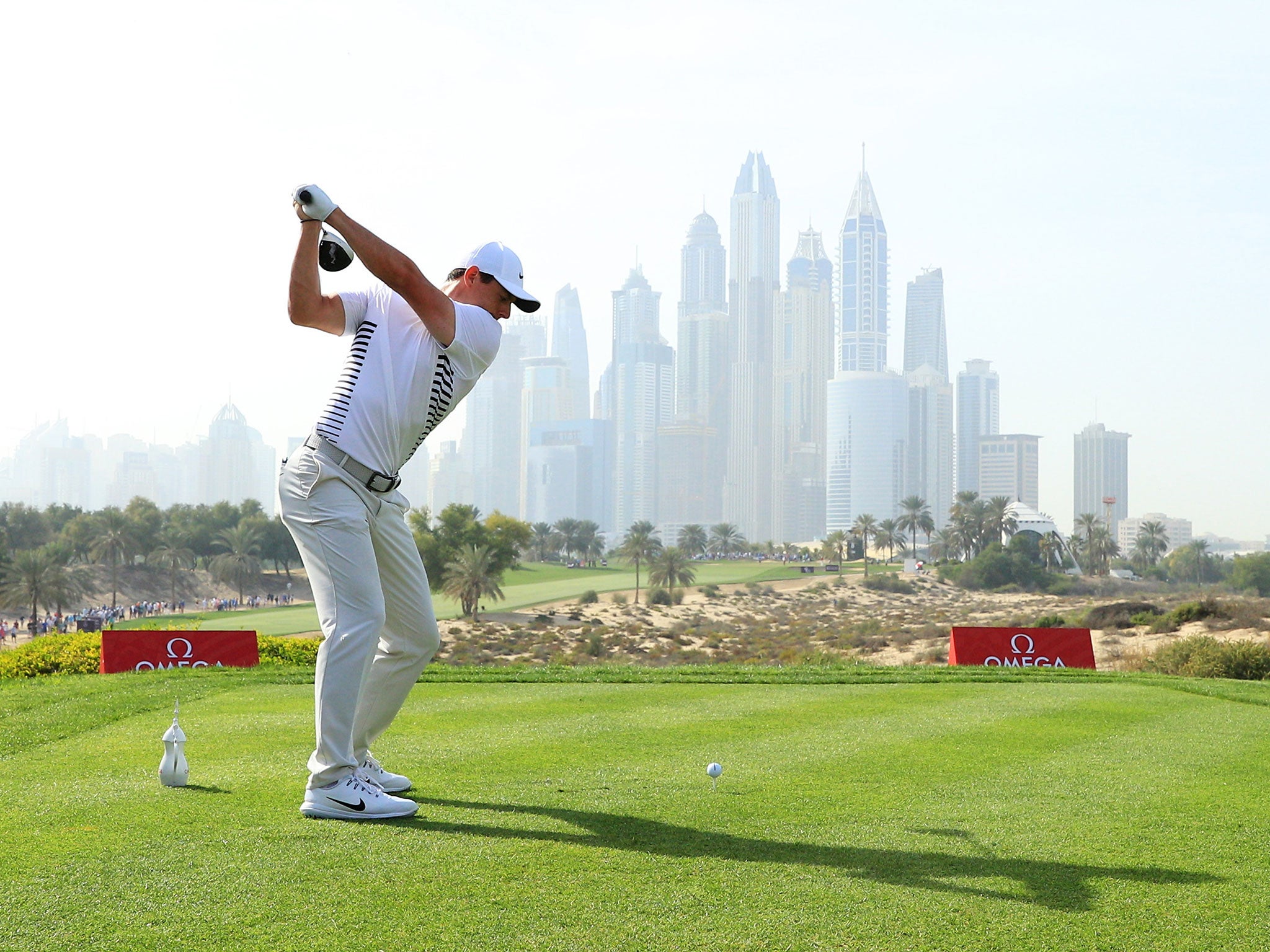 Rory McIlroy tees off on the eighth hole