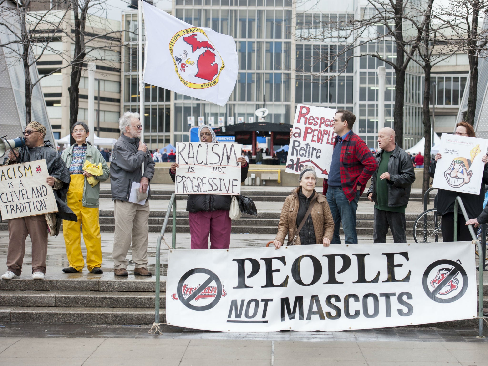 People protest Chief Wahoo outside prior to a game between the Cleveland Indians and the Minnesota Twins in Cleveland, Ohio