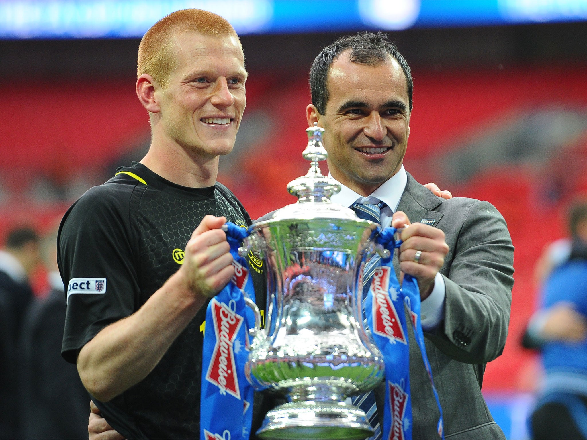 Ben Watson and Roberto Martinez celebrate Wigan's victory over Man City in the 2013 FA Cup final