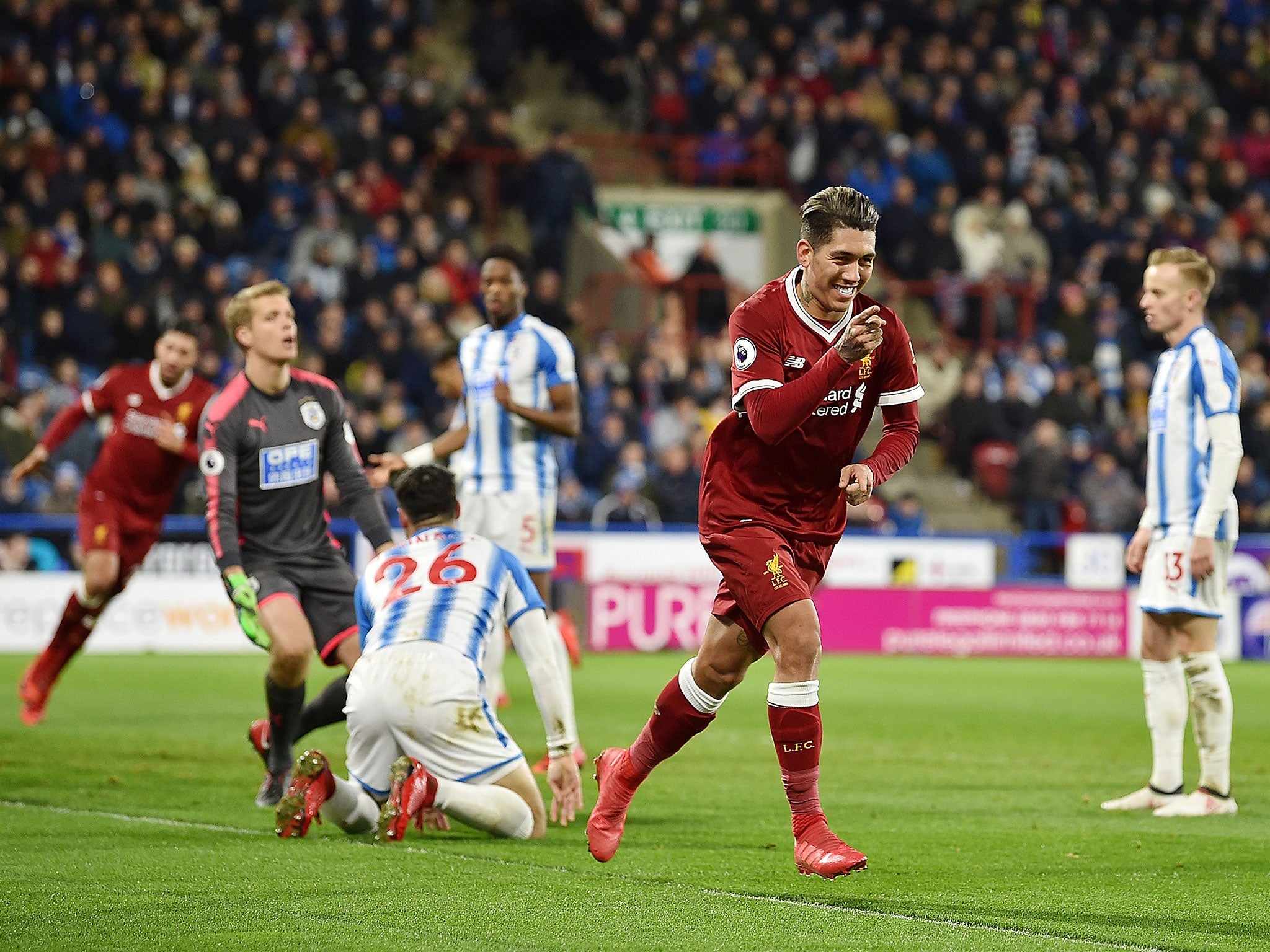 Roberto Firmino celebrates doubling the lead for Liverpool