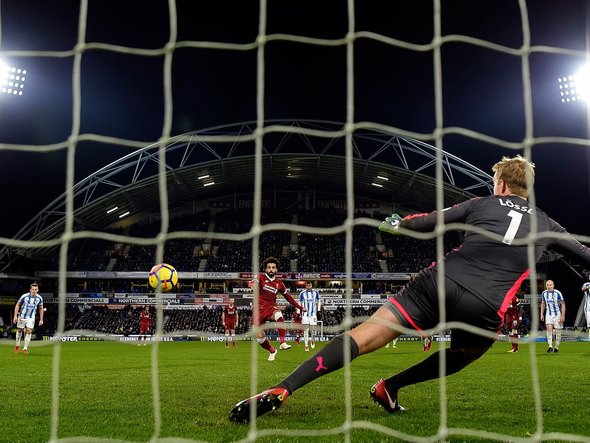 Mohamed Salah converts from the spot for Liverpool’s third