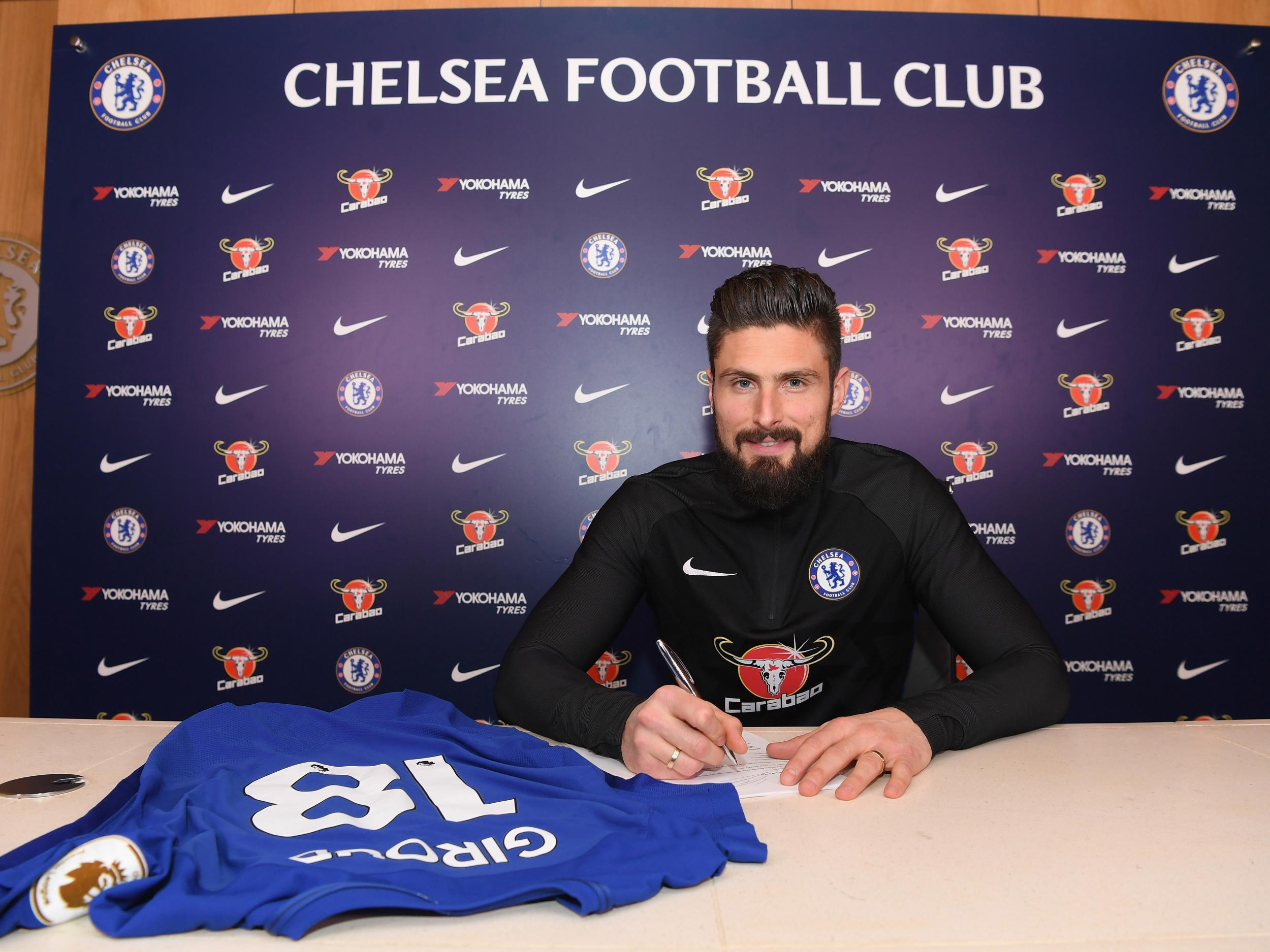 Giroud will wear the No 18 shirt at Chelsea