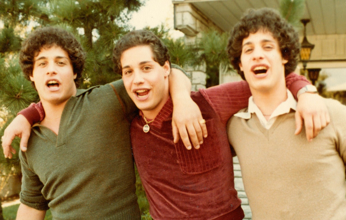 Three Identical Strangers