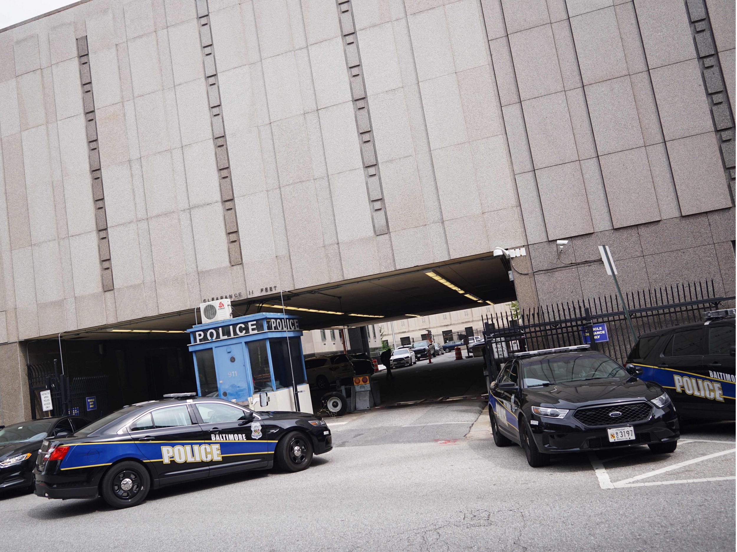 Police cars outside the Baltimore Police Department headquarters