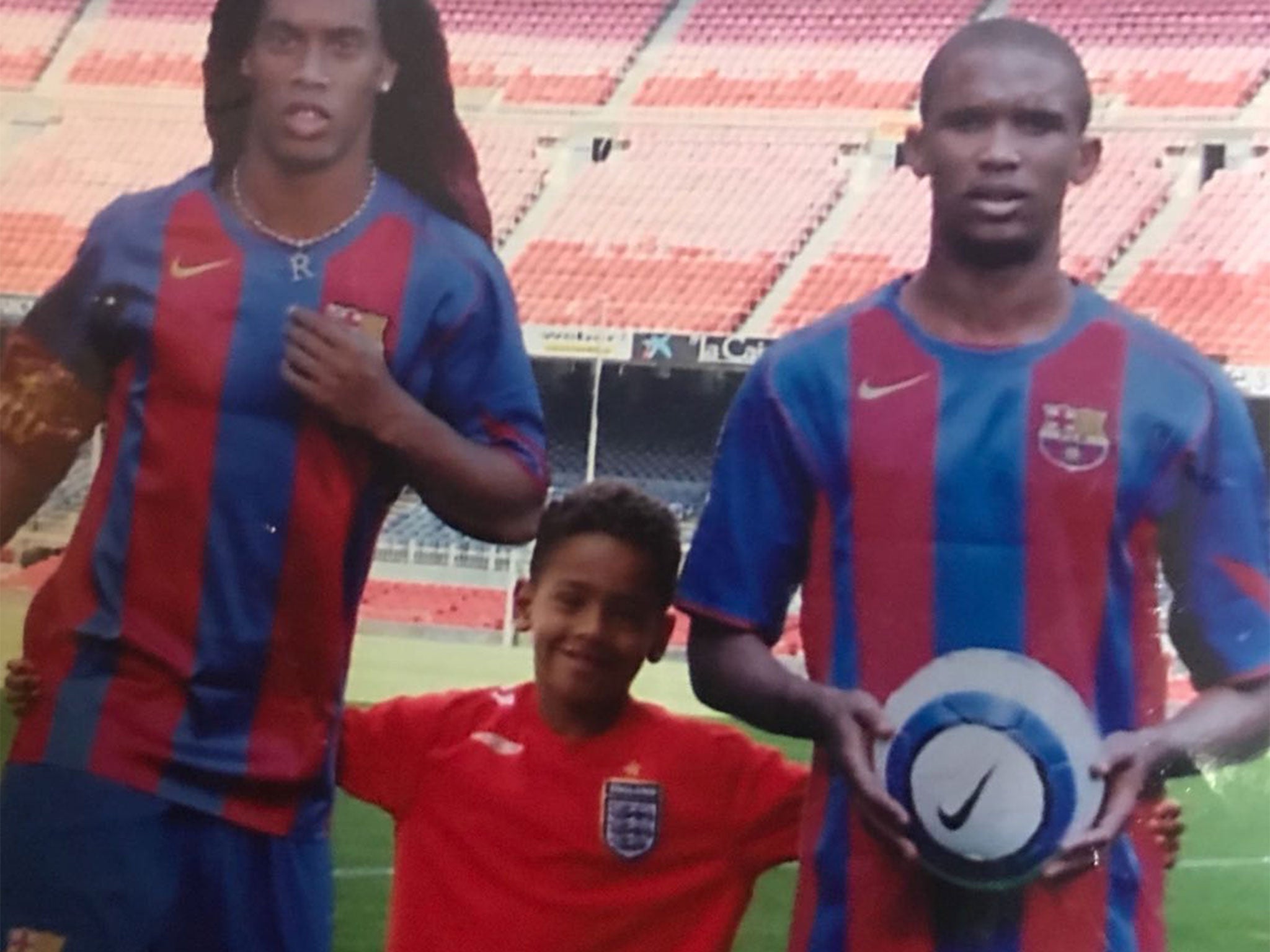 McGuane poses at the Camp Nou as a child