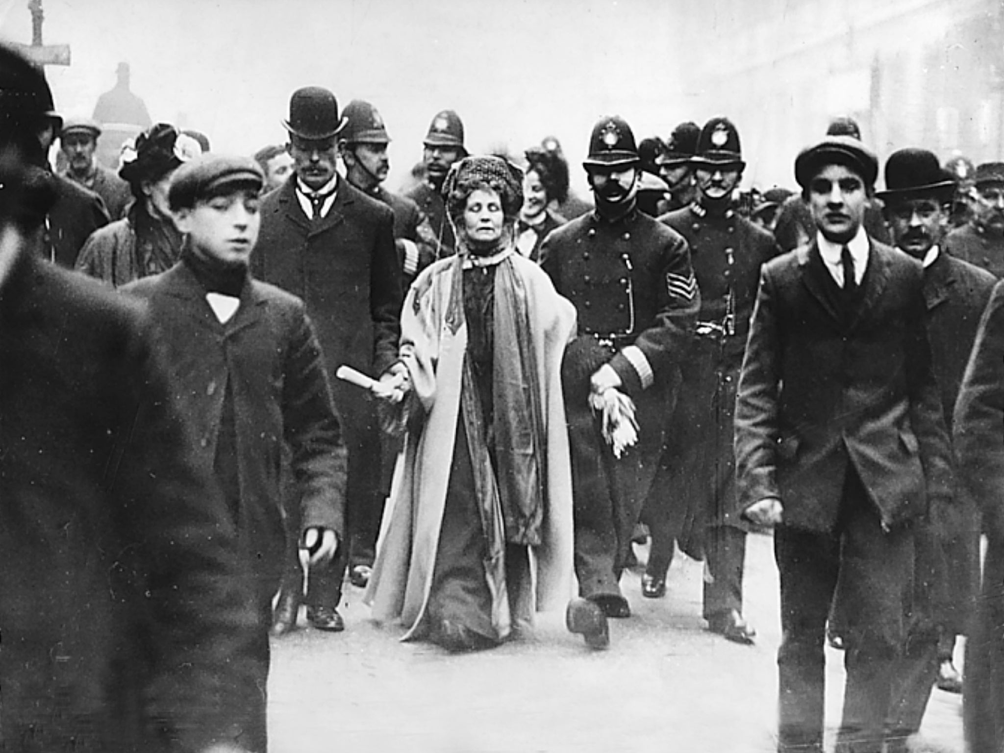 Emmeline Pankhurst is escorted by police at her eleventh arrest in 1911 (Getty)