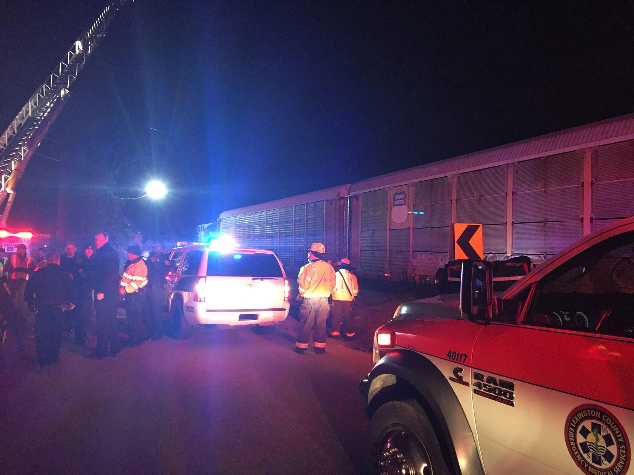 Emergency crews attend the scene of the collision and derailment near Charleston Highway, South Carolina