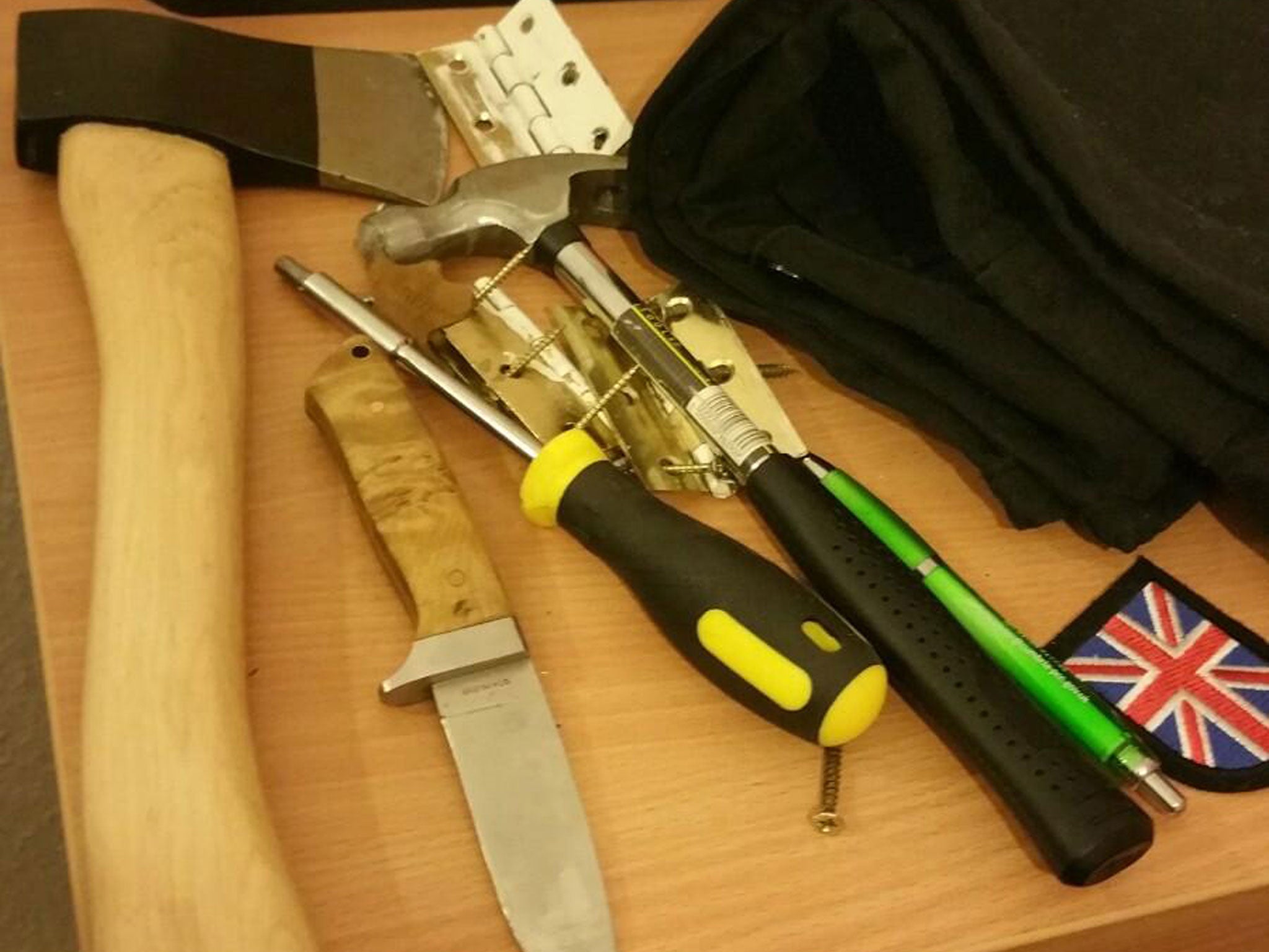 Items including an axe found by police at Ethan Stables’ home in Barrow, Cumbria