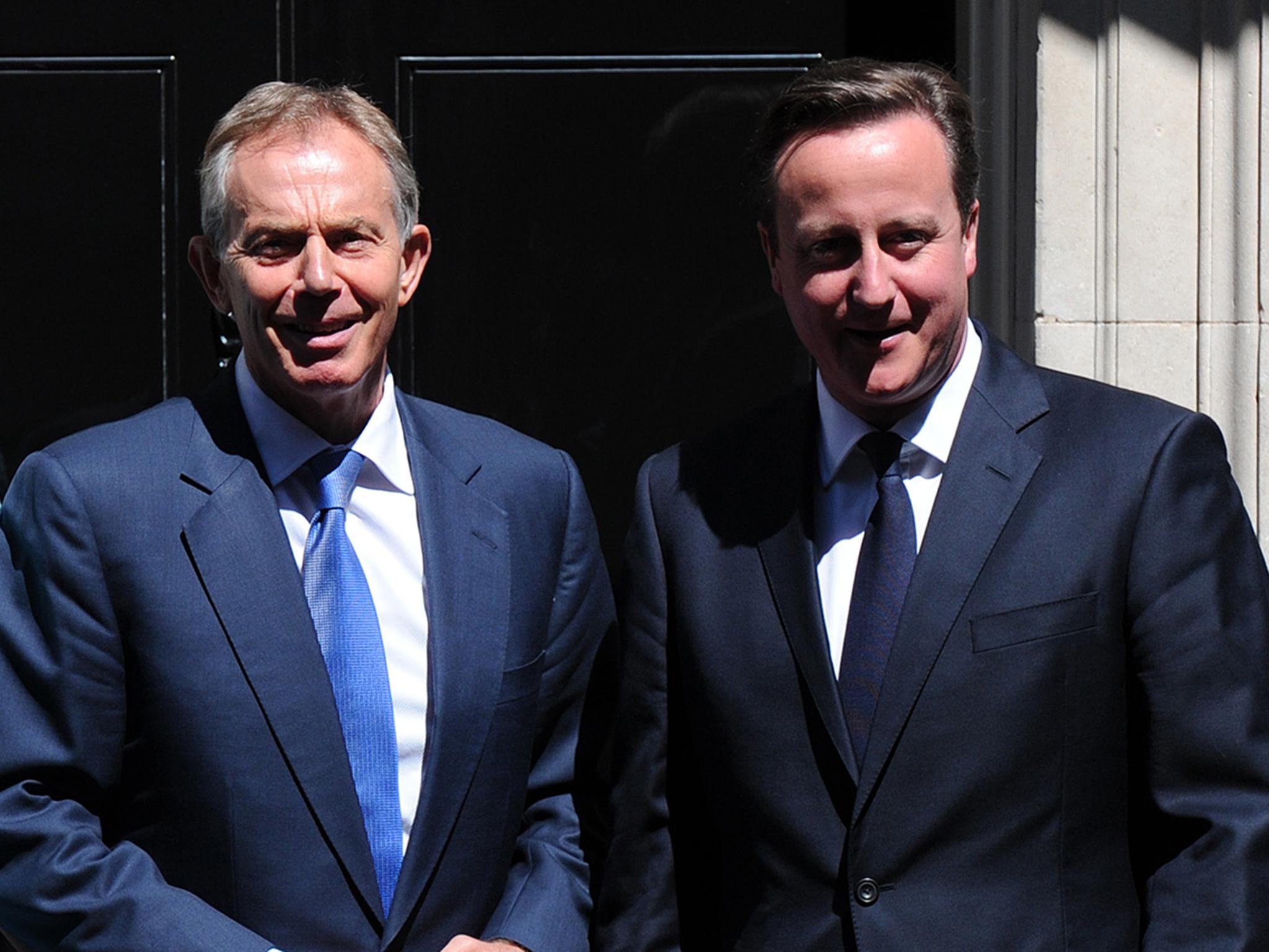 Tony Blair (L) and David Cameron (R) outside 10 Downing Street