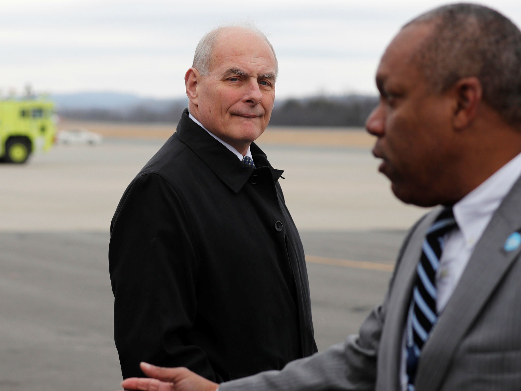 White House Chief of Staff John Kelly arrives with US President Donald Trump en route to address a Republican congressional retreat in Lewisburg, West Virginia