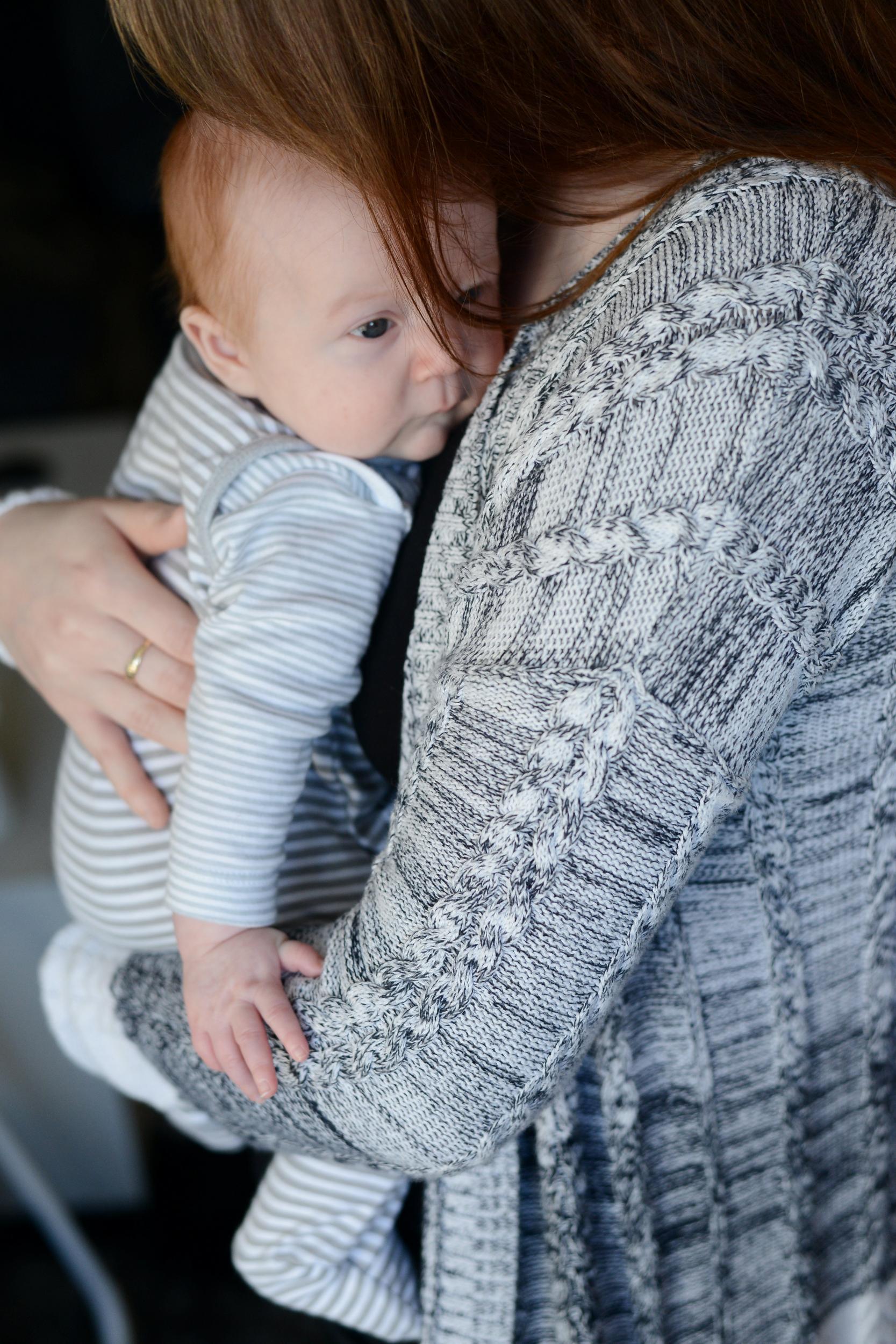 The young mother felt ashamed of breastfeeding her baby in public