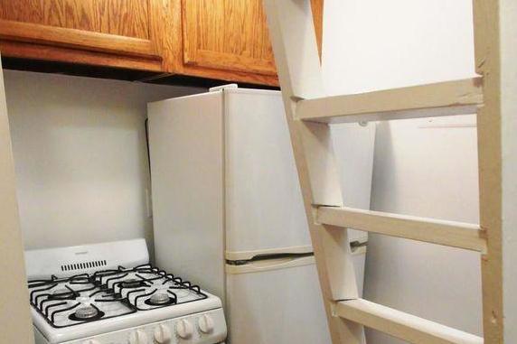 A ladder in the kitchen leads to the sleeping area (CitiHabitats)