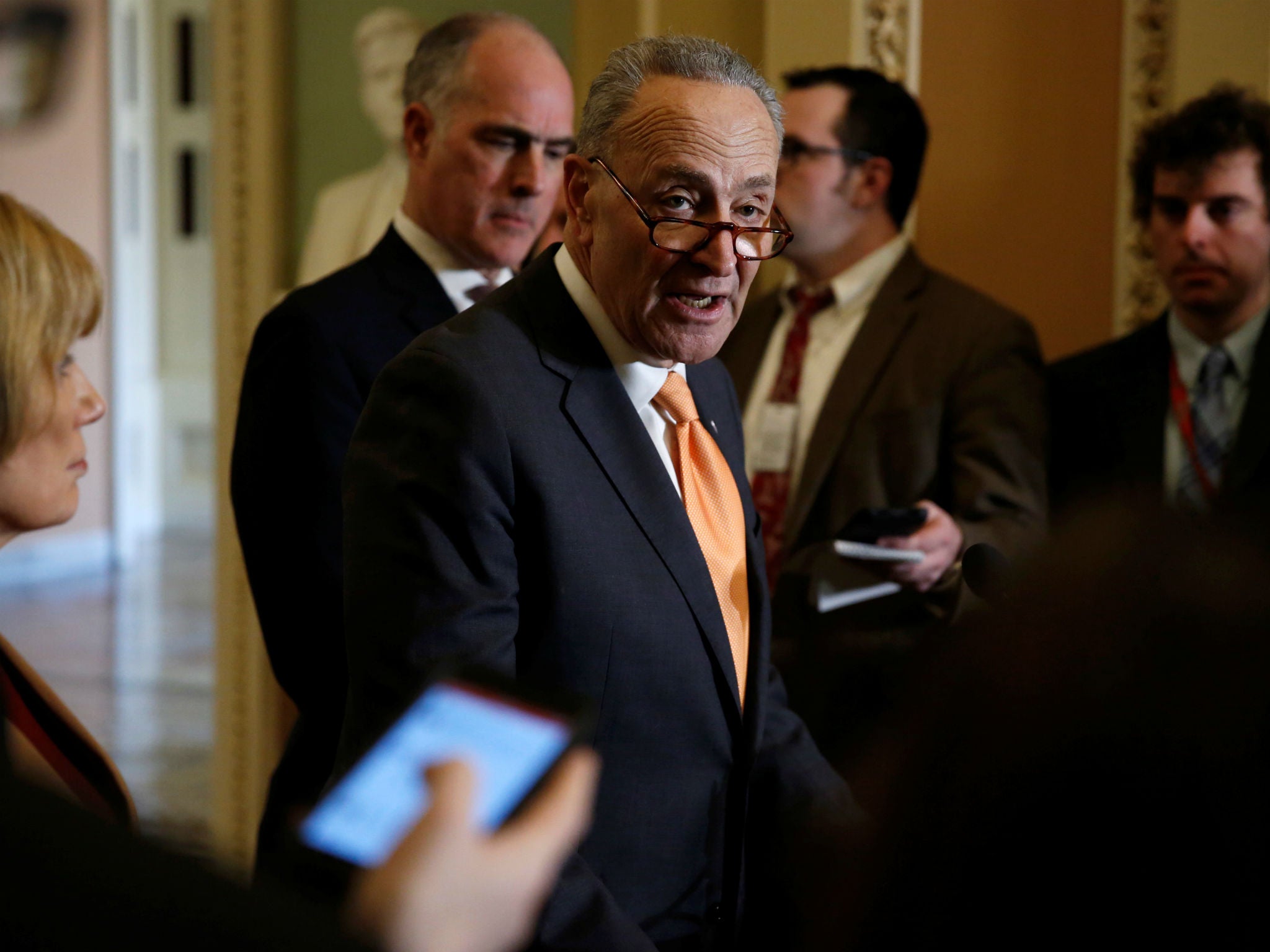 Majority Leader Chuck Schumer speaks to reporters.