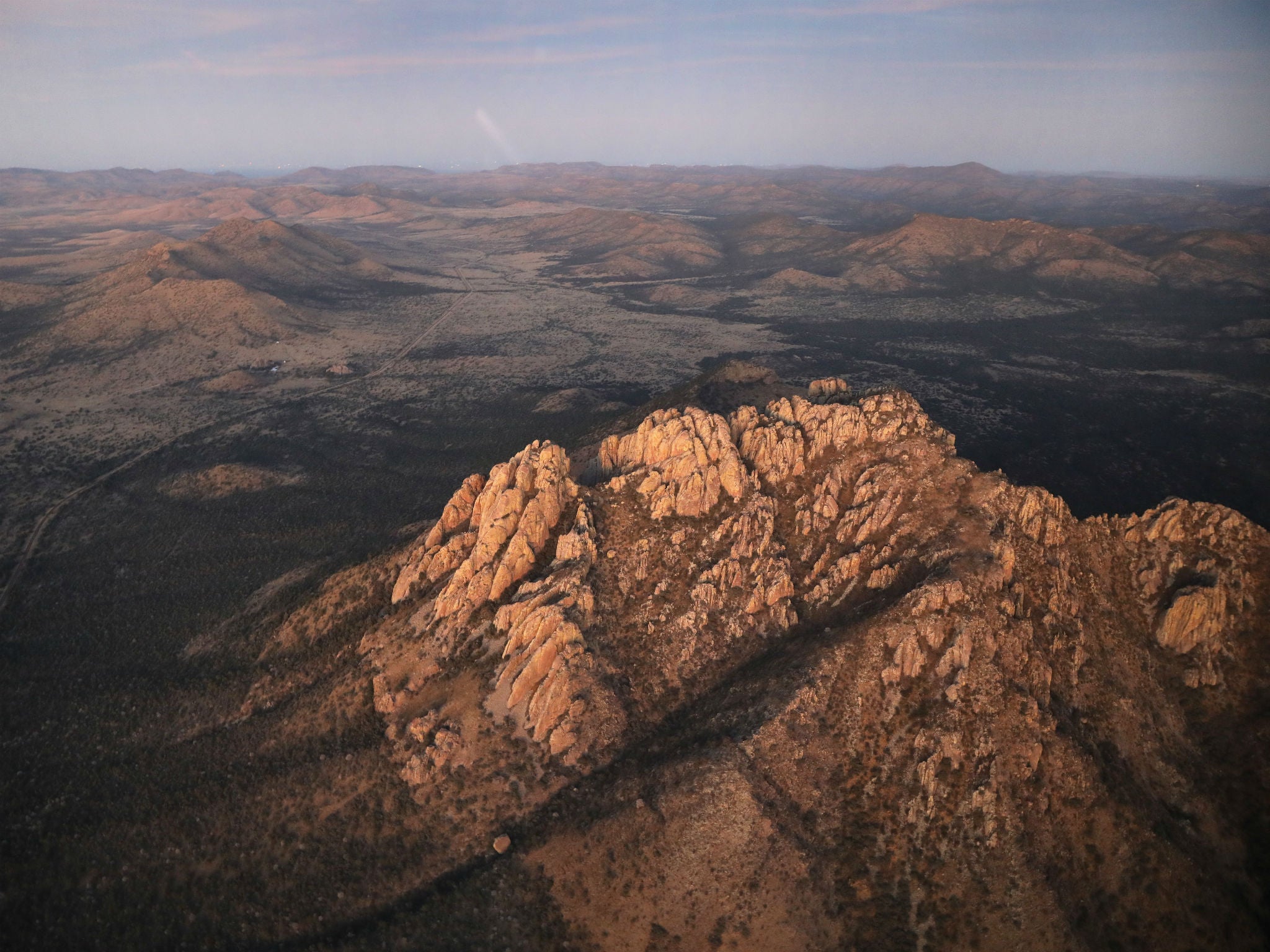 The rugged Texas terrain where authorities searched for suspects in the death of Border Patrol officer Rogelio Martinez