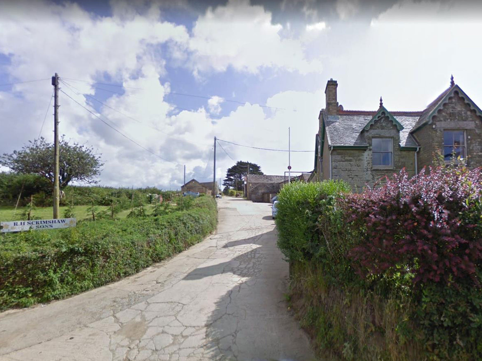 Bosahan Farm, near Manaccan in Cornwall, was targeted by police in a raid over suspected modern slavery offences (Google)