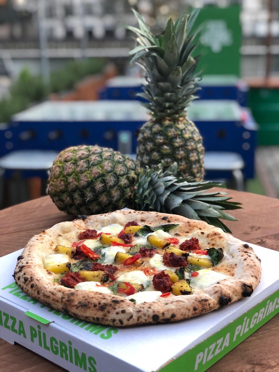 Pizza Pilgrims is reinventing the Hawaiian pizza with honey roast pineapple, spicy nduja, buffalo mozzarella and fresh chilli for National Pizza Day