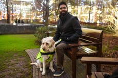 Guide dog camera captures moment angry commuter confronts blind man on tube escalator