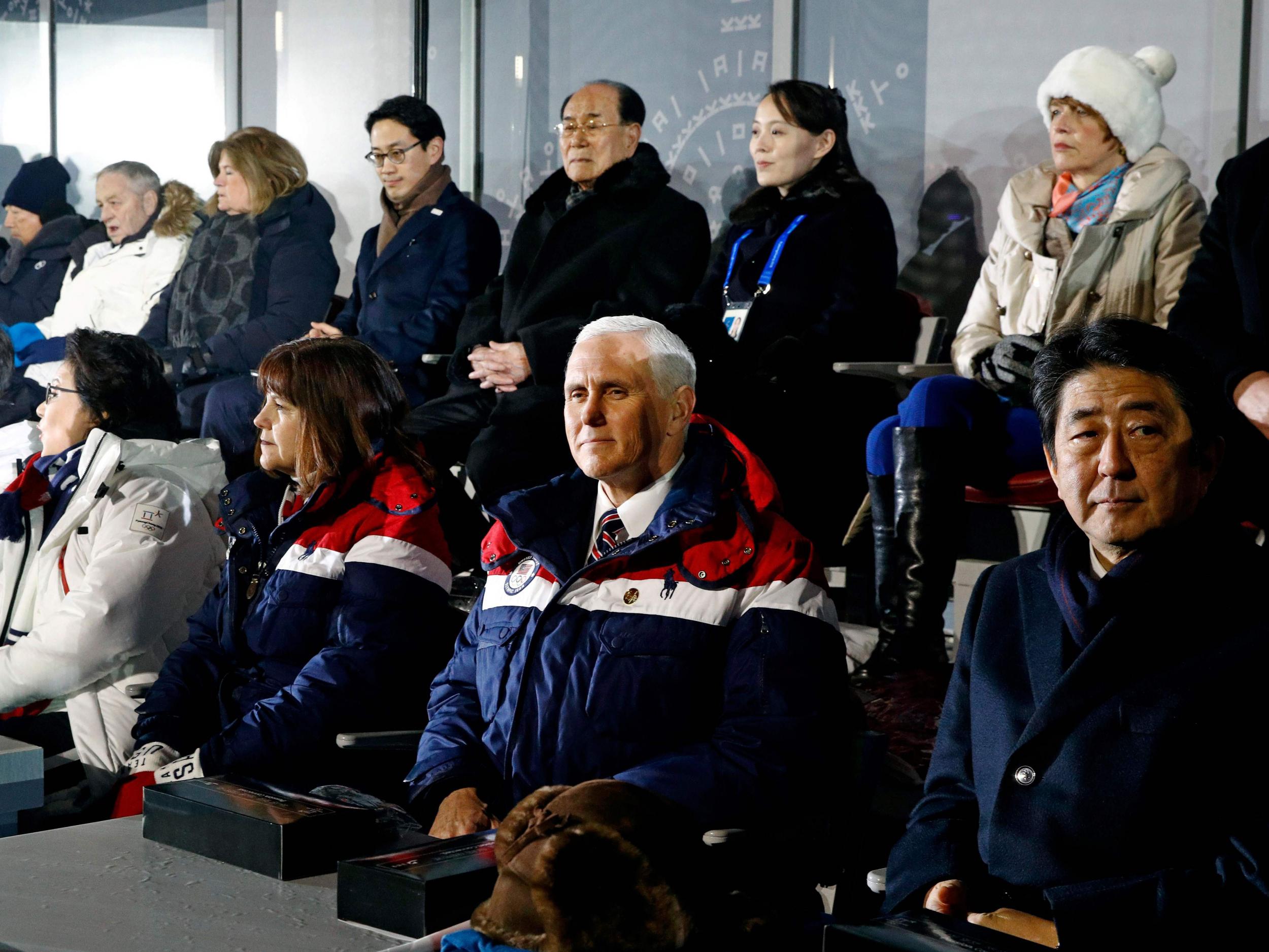 &#13;
Mike Pence (front 2nd right) sits just feet from Kim Jong-un's sister Kim Yo-jong (back 2nd right) &#13;