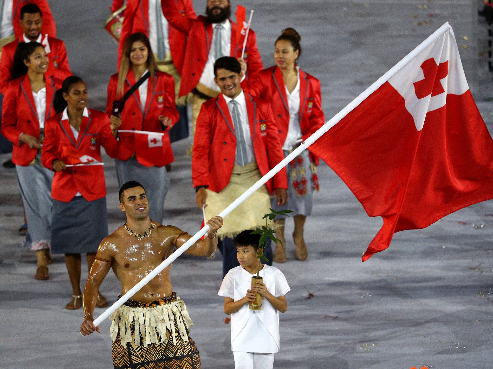 Taufatofua also carried the Tongan flag topless at the 2016 Olympic Games in Rio