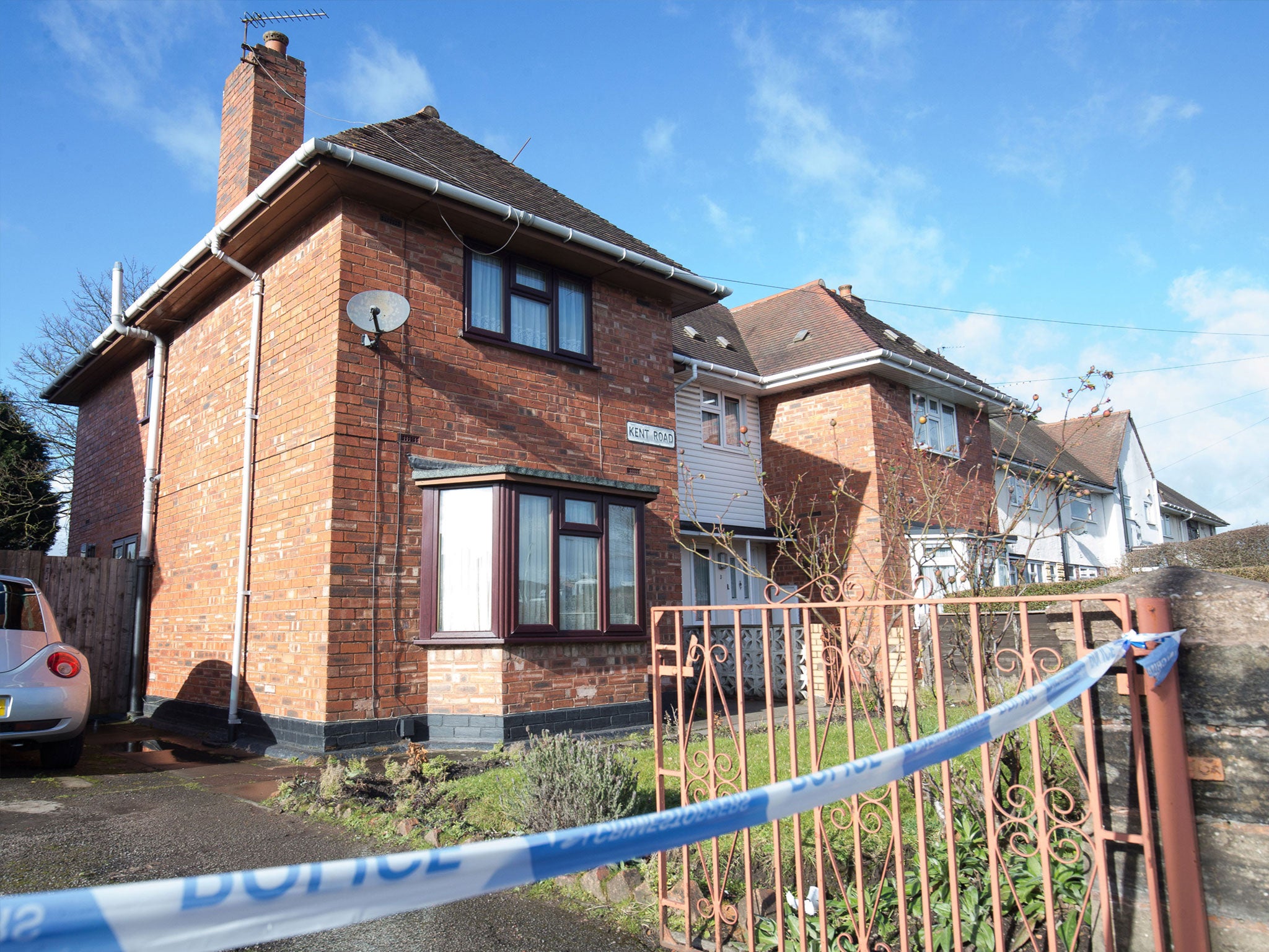 The house remains cordoned off to allow forensic experts to conduct an examination