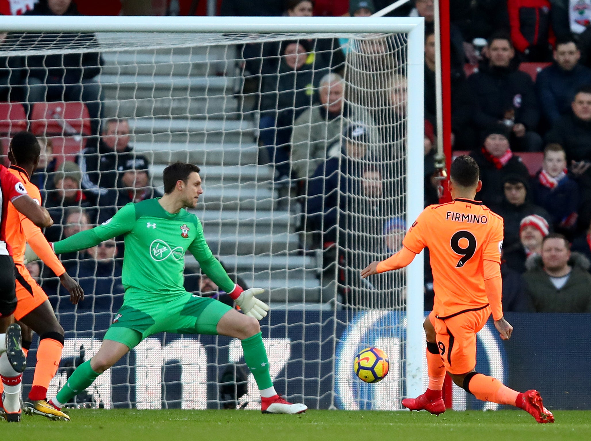 Roberto Firmino scores past Southampton goalkeeper Alex McCarthy