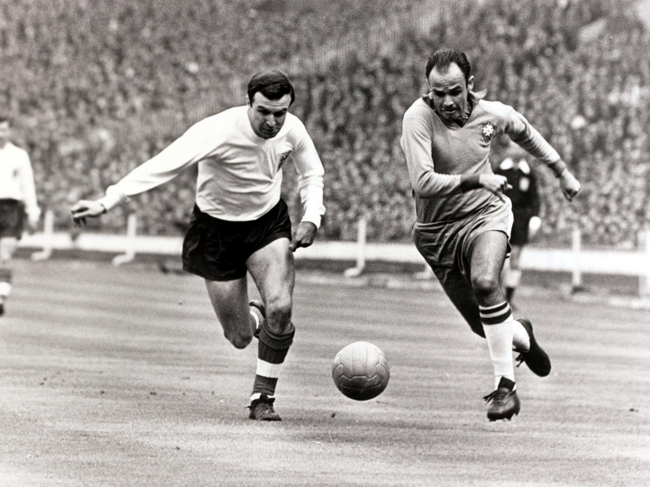 Armfield (left) in a race for the ball with Macia Jose Pepe at a friendly between England and Brazil in May 1963. The game ended 1-1