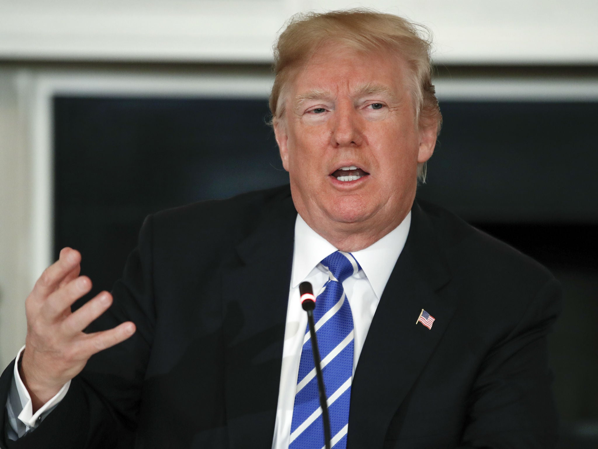 Donald Trump talks at a meeting with state and local officials about infrastructure at the White House