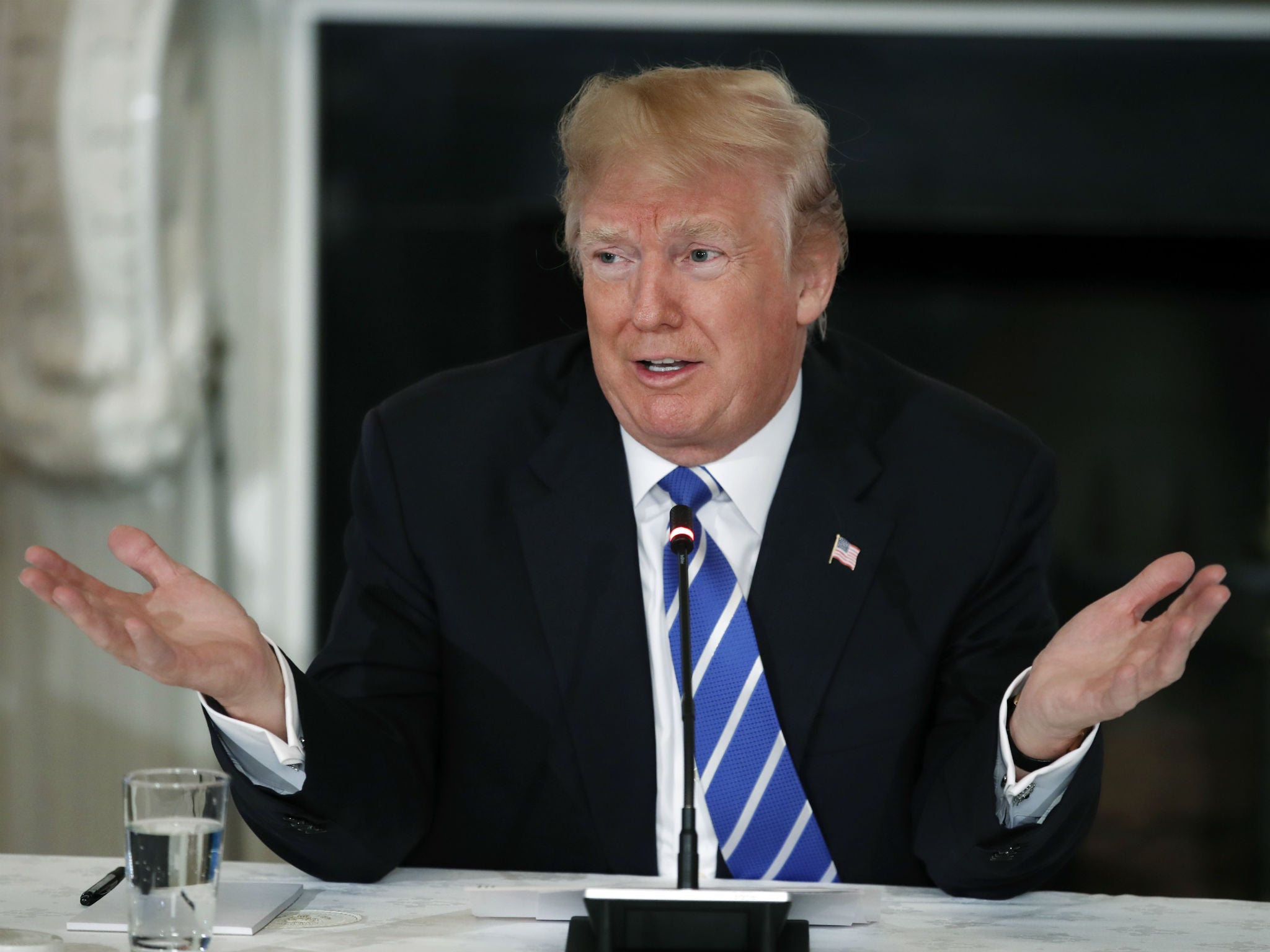 President Donald Trump speaks during a meeting with state and local officials about infrastructure