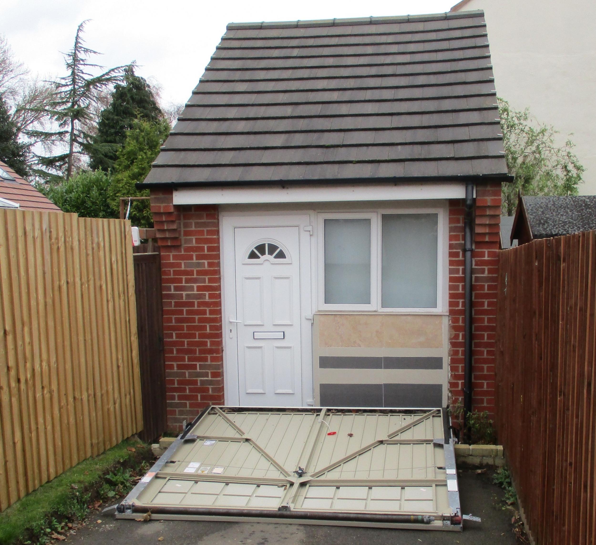 Undated handout photo issued by Blaby District Council of a garage in Enderby, Leicestershire, which was converted into a secret home without permission