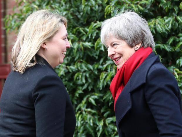 Secretary of State for Northern Ireland Karen Bradley greets Prime Minister Theresa May in Belfast