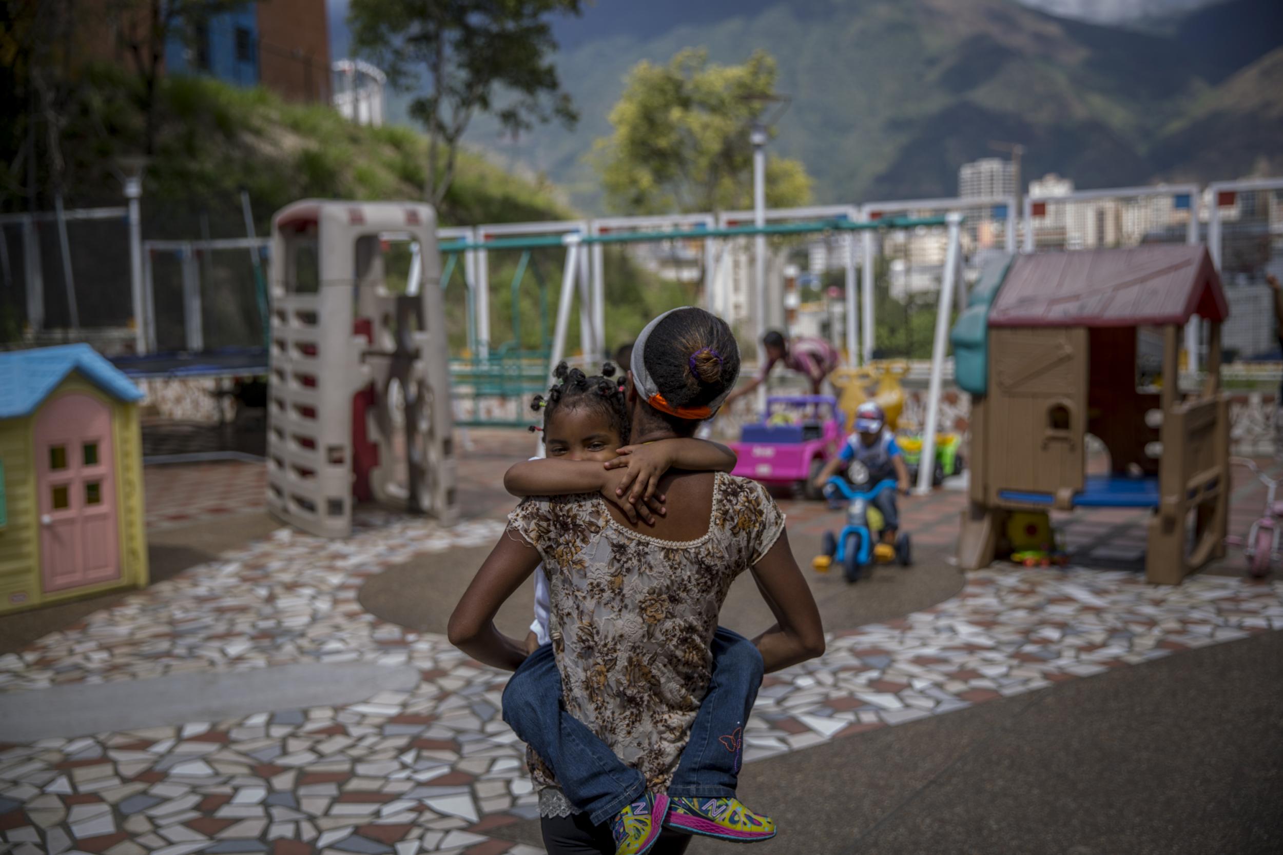 Dayana Silgado visits her daughter at Fundana, a nonprofit orphanage in Caracas