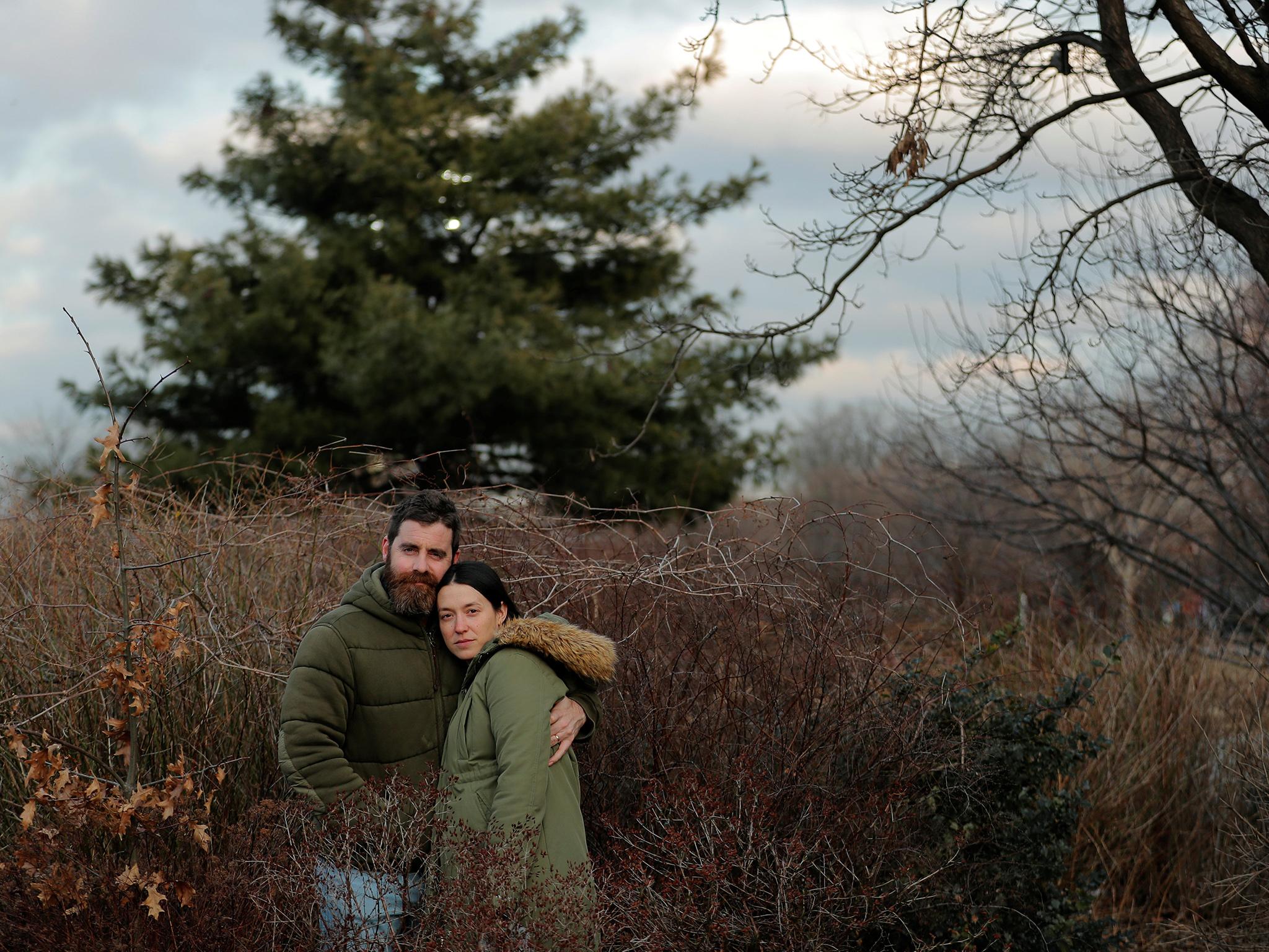 Jenny Ostrom, 37, a director of photography and her husband Chad Ostrom, 37, a director, stand in McCarren Park, near their home in the Brooklyn borough of New York, U.S., February 8, 2018. "We met the first day of college in the middle of the heartland, Kansas. My friends and I thought it noble to help the arriving freshman girl students move into the dorms. There was Jenny, unpacking boxes with her family and in classic, comedy double-take action I walked by her room, stopped, and walked right back to it. Through three states, long-distance dating, high times, low moments and 19 years later, we now share a home, a little girl and a life," said Chad. REUTERS/Lucas Jackson