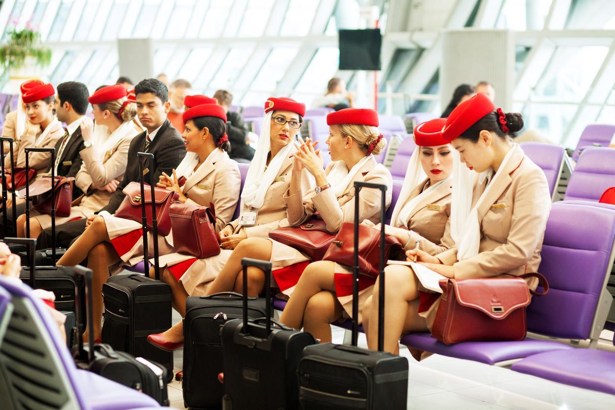 Members of Emirates cabin crew pictured in Bangkok airport