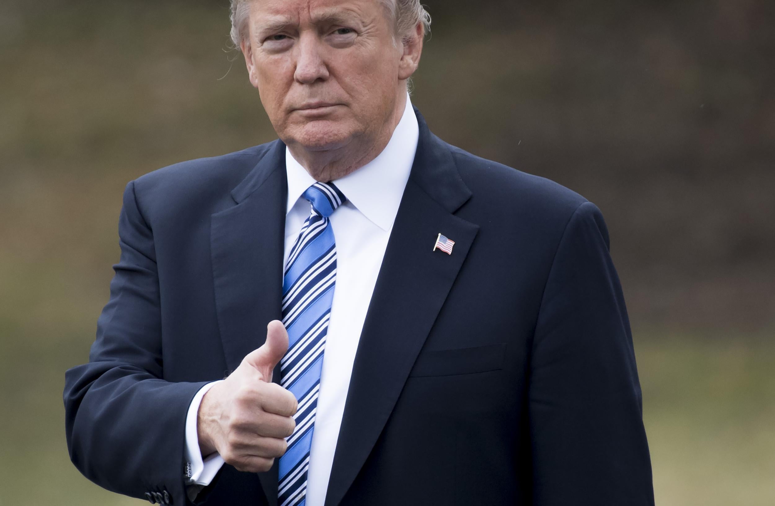 US President Donald Trump gives a thumbs-up as he walks to Marine One prior to departure from the South Lawn of the White House