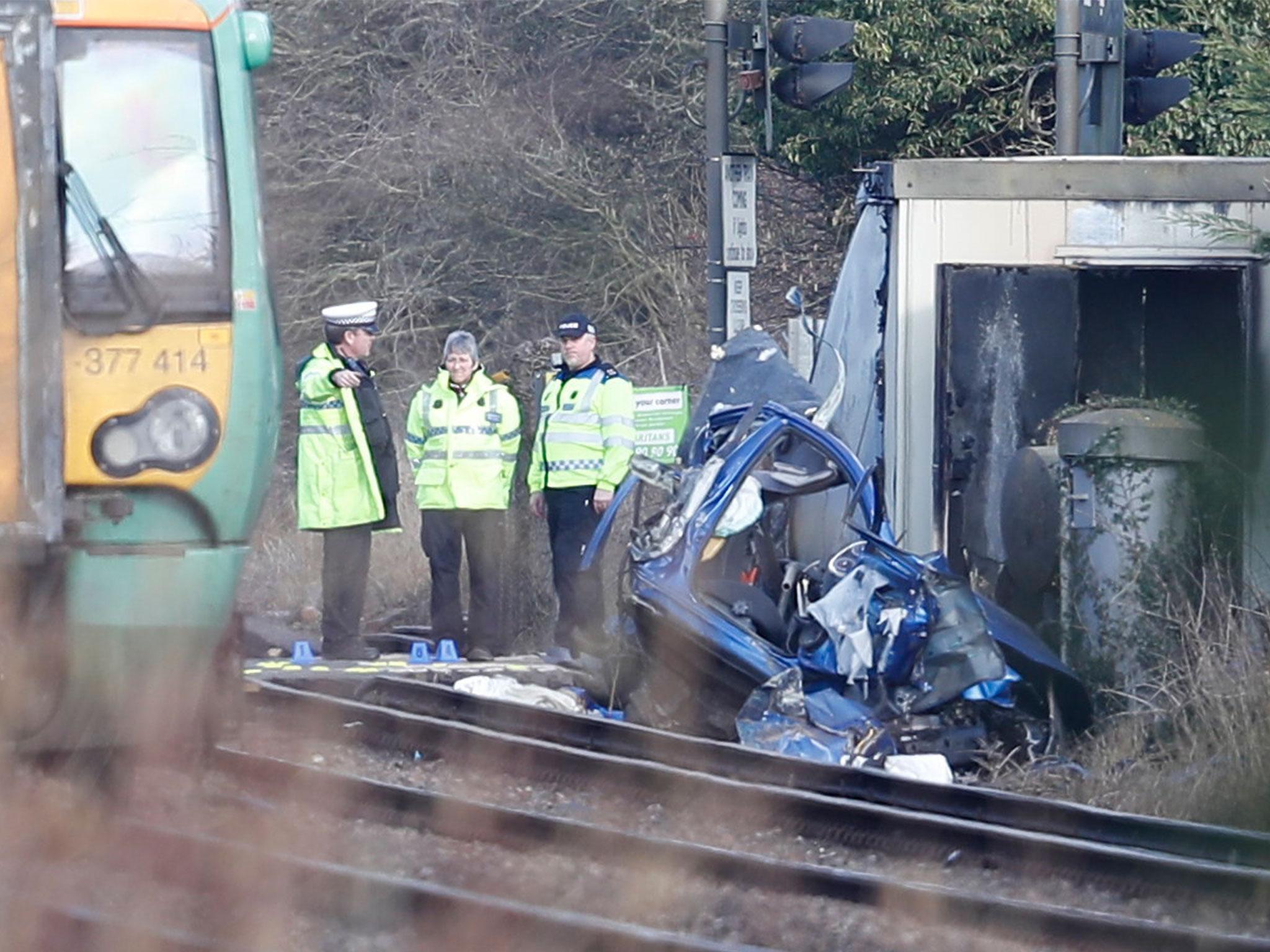 Officers at the site of the incident, which has left two people dead