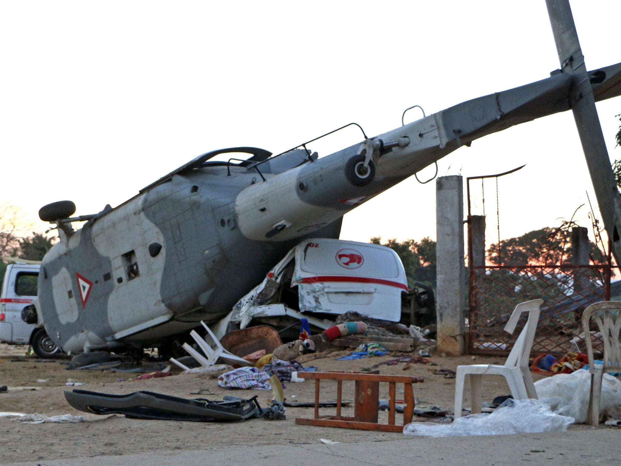 The remains of the military helicopter that fell on a van in Santiago Jamiltepec