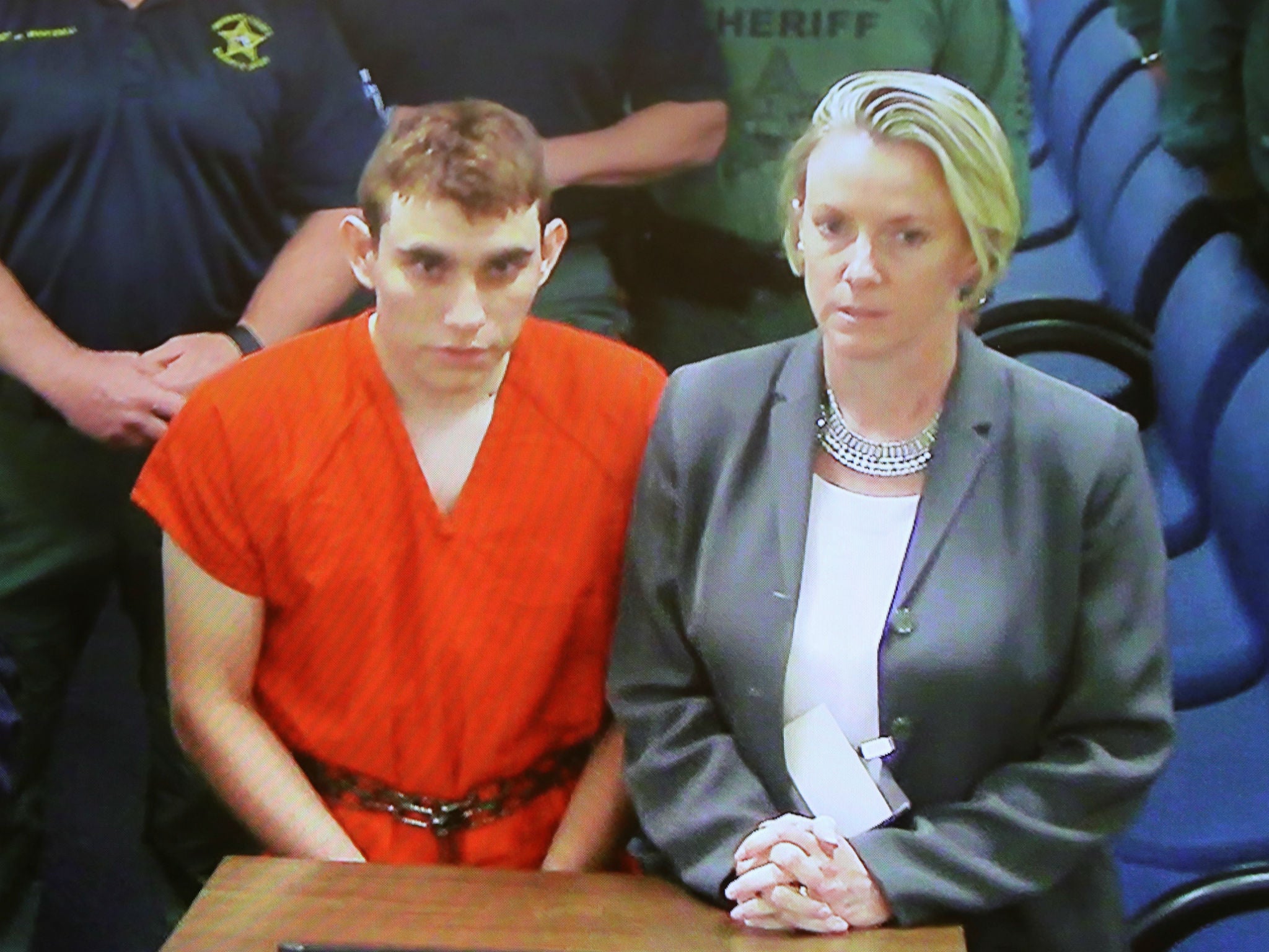 Nikolas Cruz appears via video monitor with his public defender Melisa McNeill at a bond court hearing in Fort Lauderdale, Florida