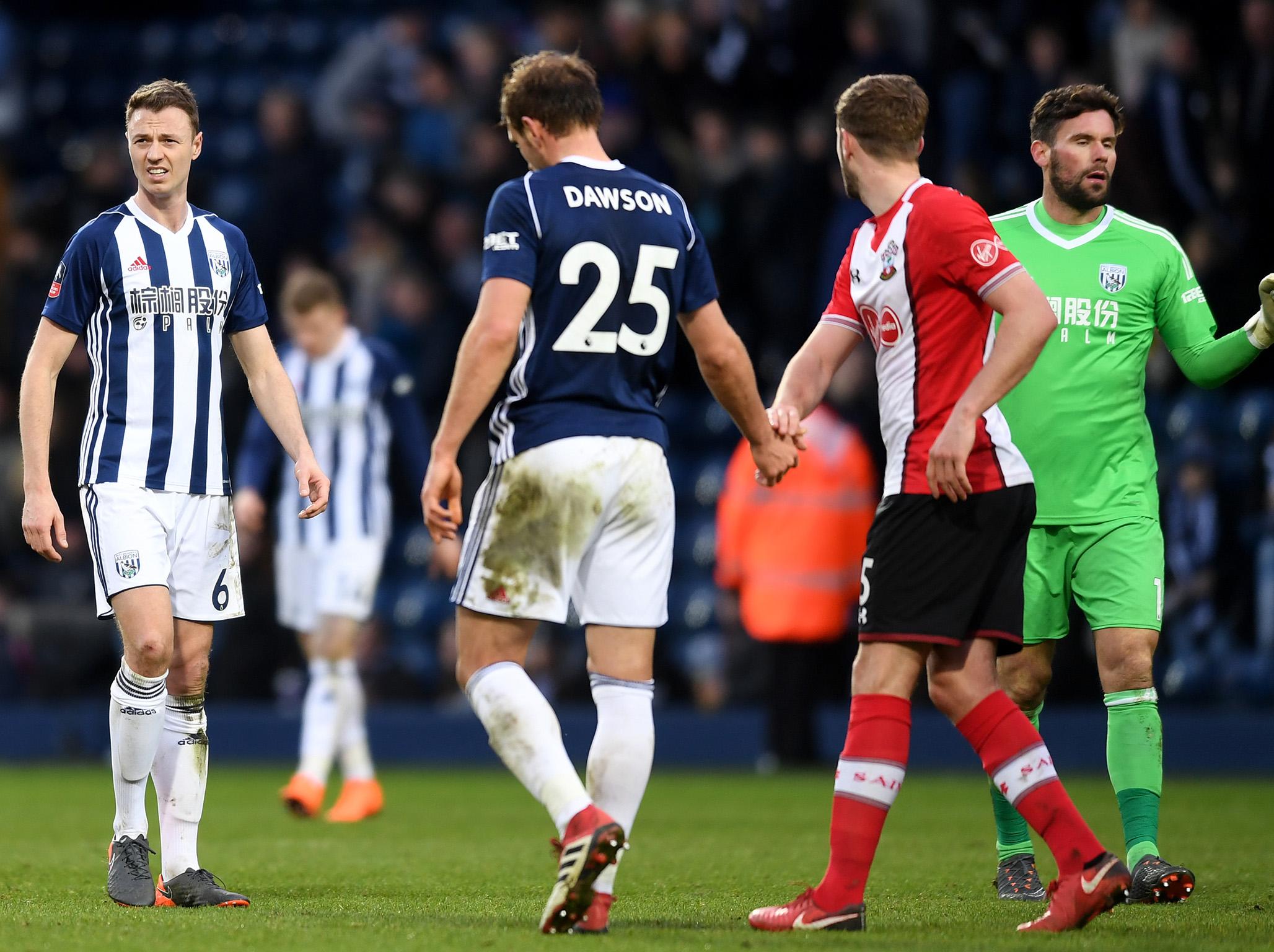 Jonny Evans, left, was one of four players involved in the Barcelona incident (Getty)