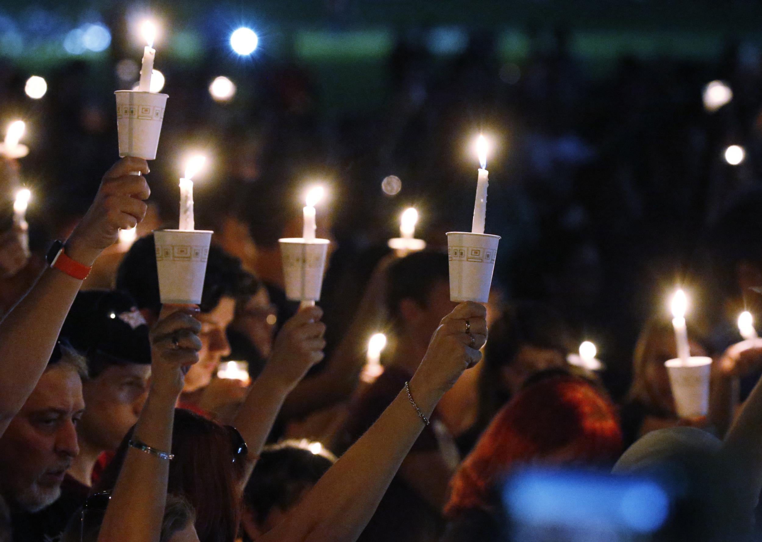 Candles at one of the vigils honouring the victims at Stoneman High