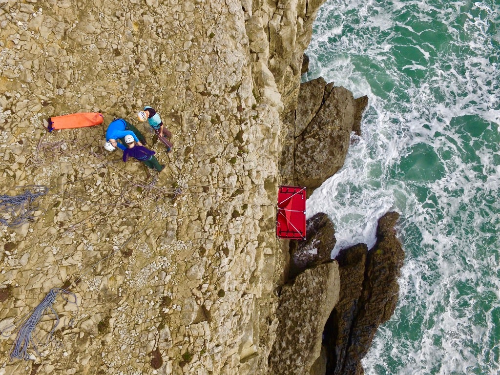 Cliff camping means sleeping over the edge of a cliff