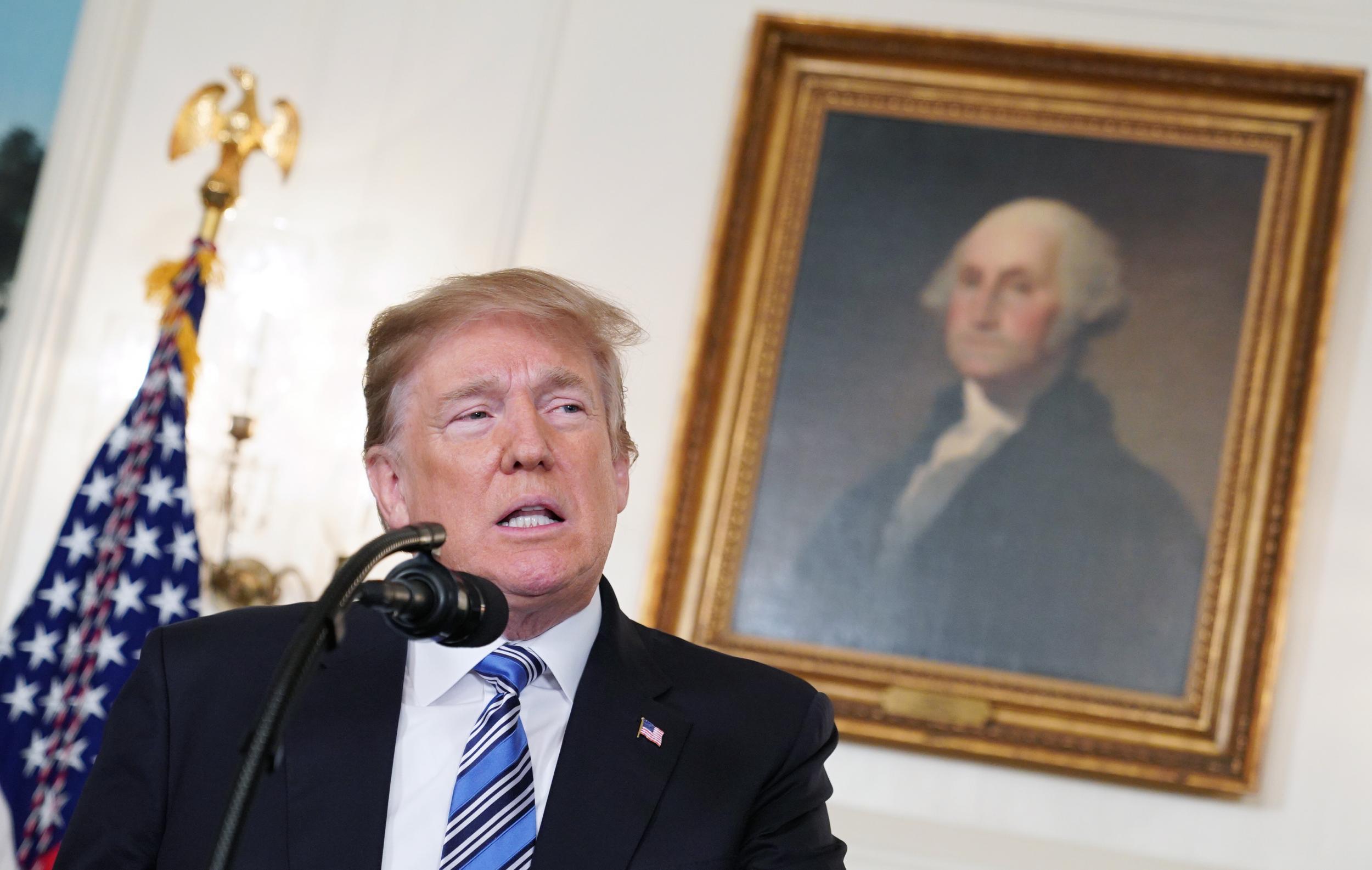 US President Donald Trump speaks on the Florida school shooting, in the Diplomatic Reception Room of the White House