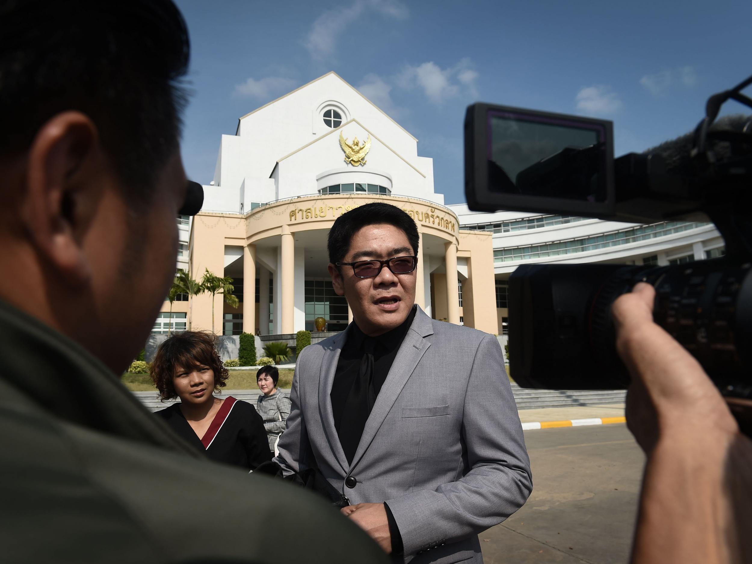 Kong Suriyamontol, lawyer for Japanese national Mitsutoki Shigeta, speaks to the press after his client was granted paternity rights to his children