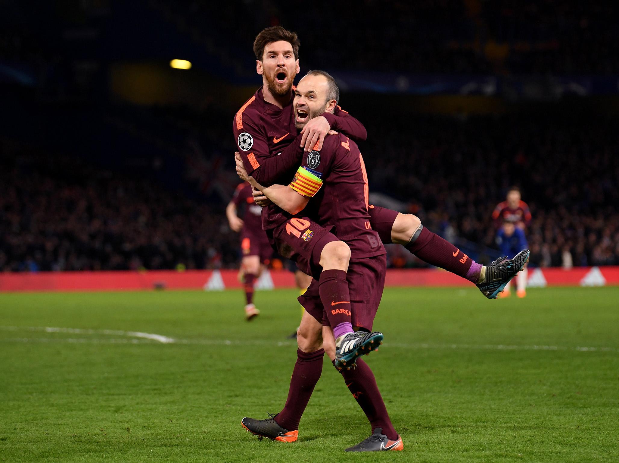 Messi and Iniesta celebrate the former’s strike