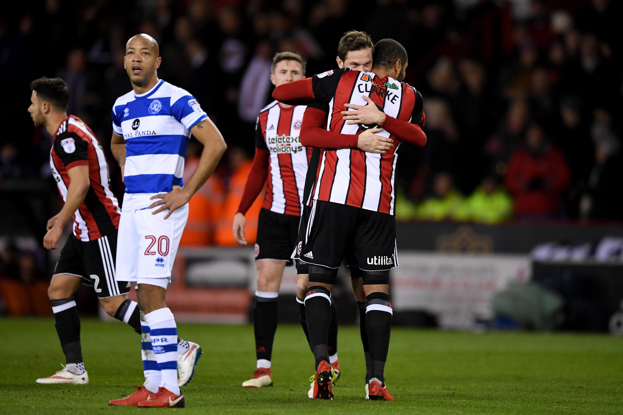 Richard Stearman and Leon Clarke celebrate Sheffield United's opener