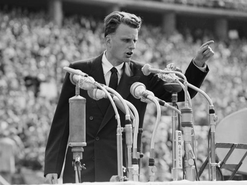 Graham addresses 100,000 people at Berlin’s Olympic Stadium in 1954