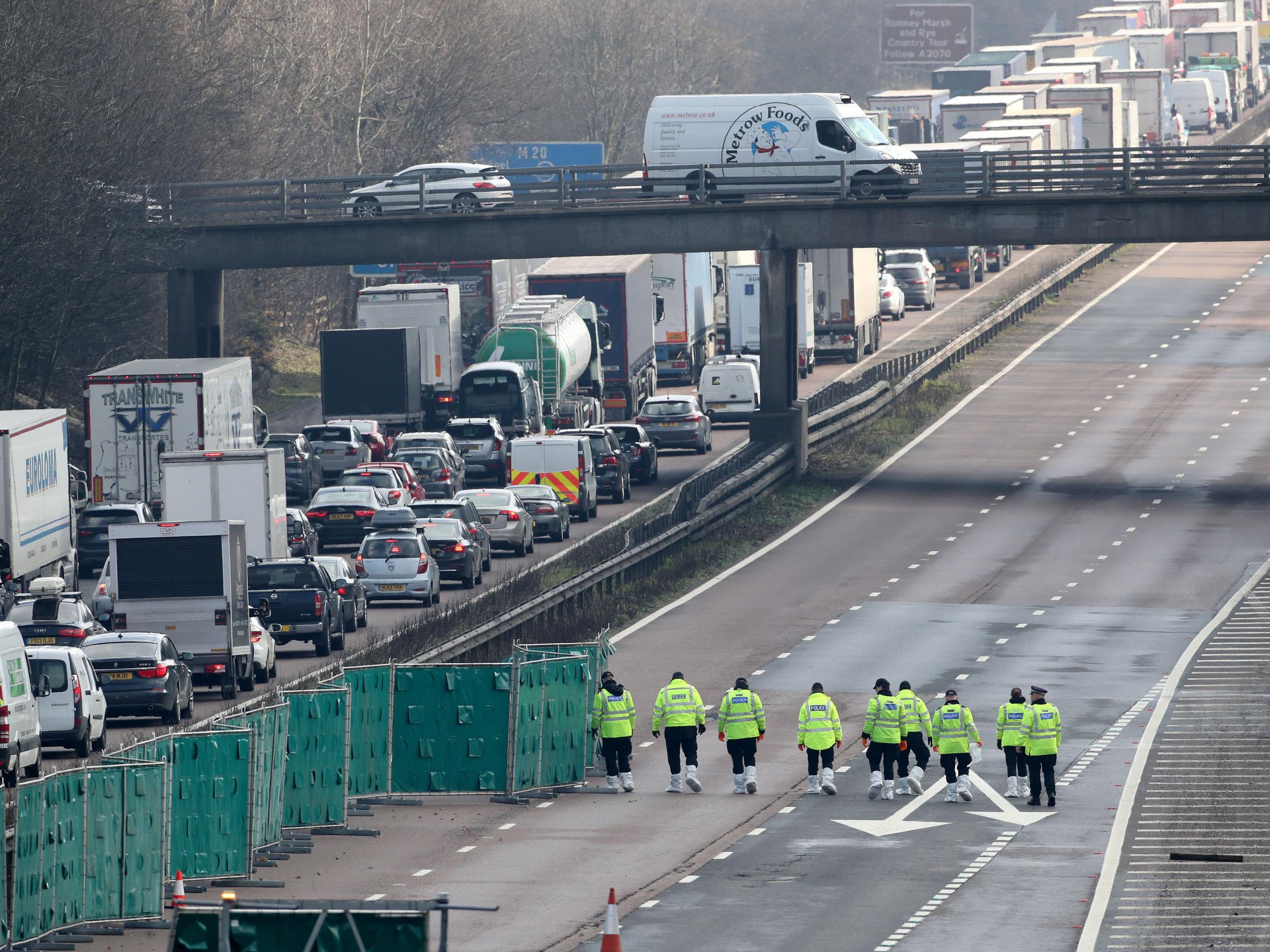 Police officers at work on the M20 near Ashford in Kent